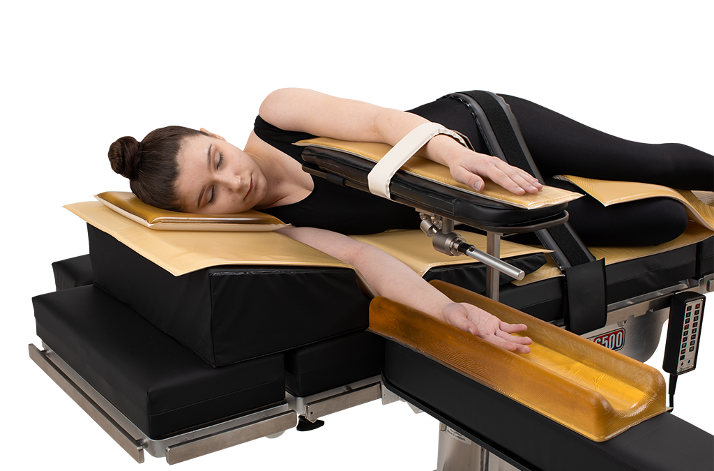 cutout of a woman lying in the lateral position on a surgical table