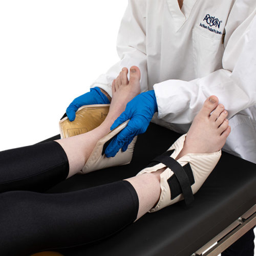 Heel Protector Pad being placed on a patient by a nurse