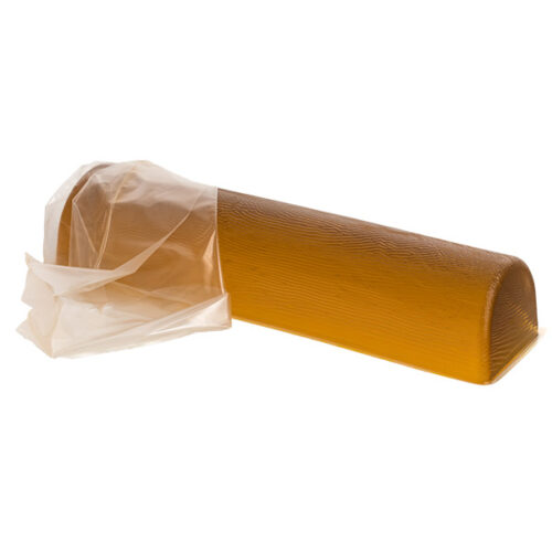 disposable cover being removed from an adult-sized chest roll