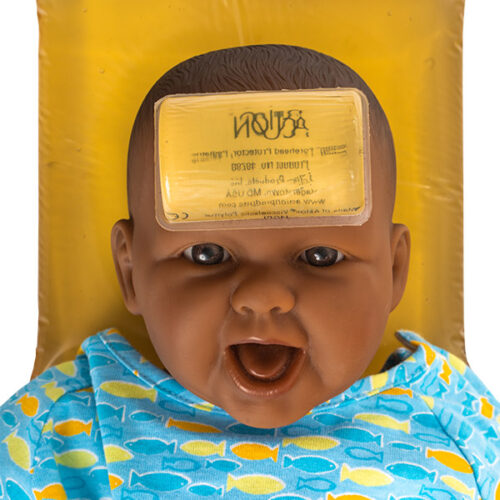 Pediatric Head Pad being modeled on a fake baby