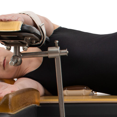 small patient positioned with axillary roll model