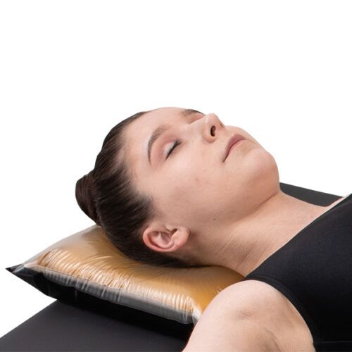 patient in the supine position with her head on a supine head pad