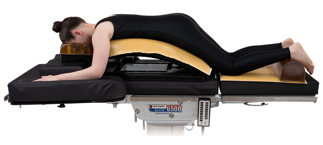 patient in prone position with ACTION positioning products