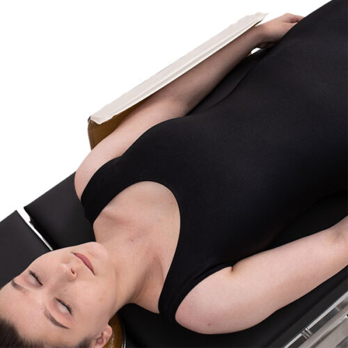 toboggan pad and shield being used on a female patient