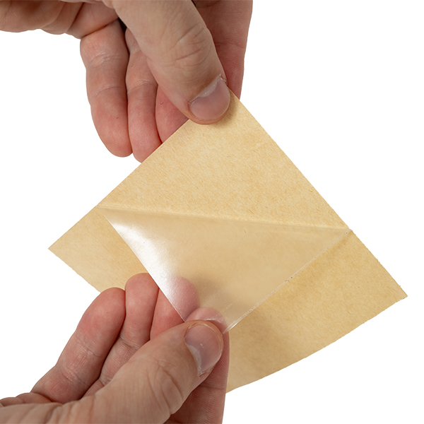 showing resurfacing film tape being peeled from backing